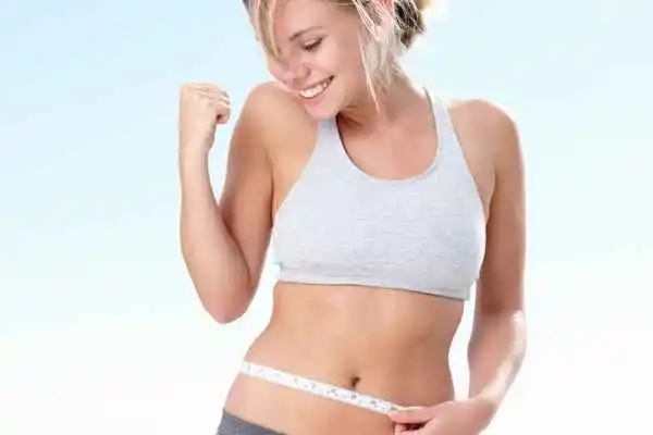 woman happy after fat reduction treatment East Bedfont
