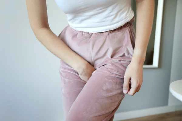 woman struggling with urine incontinence East Bedfont
